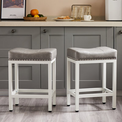 Michille Saddle Upholstered 24.21" Counter Stool