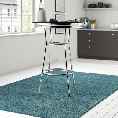 Hagert Round with Steel Base Dining Table