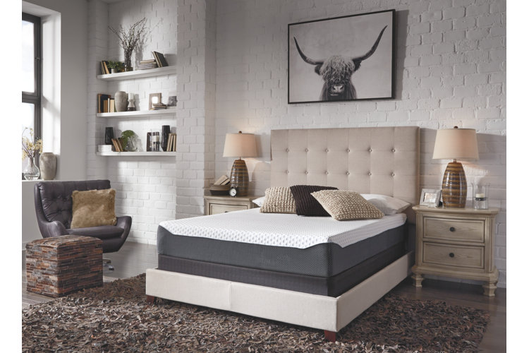 full-size bed with an upholstered bed frame and a latex mattress in a southwestern style bedroom
