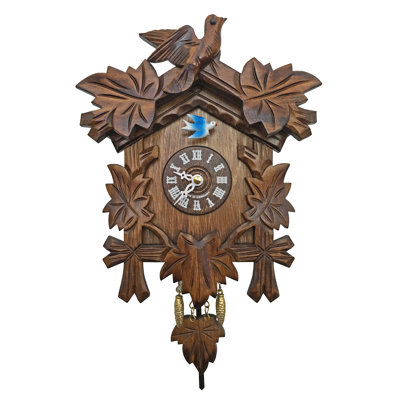 Horloge murale sculptée