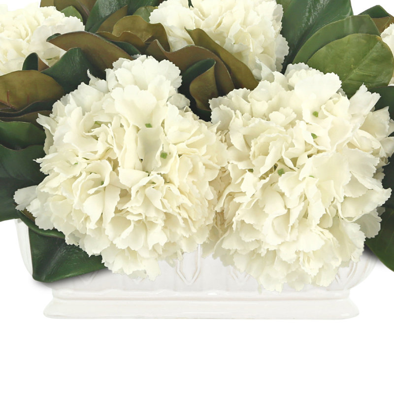 Floral Arrangement with Hydrangeas and Magnolia Leaves
