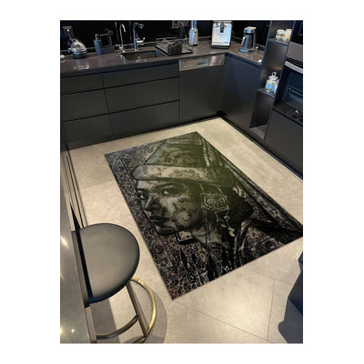 Tapis noir lavable à motif tissé noir