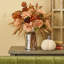 Warm Blooms - Brown Dried Look Artichoke, Foxtails & Mixed Tan Mums Water Illusion Arrangement in Silver Bottle Vase With Brown Raw Velvet Bow Ribbon