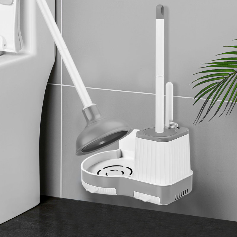 Brosse de toilette et piston