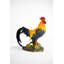 Statue coq debout sur du maïs