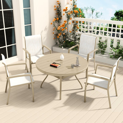 Ensemble de salle à manger d'extérieur 5 pièces comprenant 4 chaises empilables et une table ronde en métal de 103 cm (40,6 po), idéal pour les réceptions entre amis. Sièges respirants, pieds antidérapants, design ergonomique, finitions polies à la main.