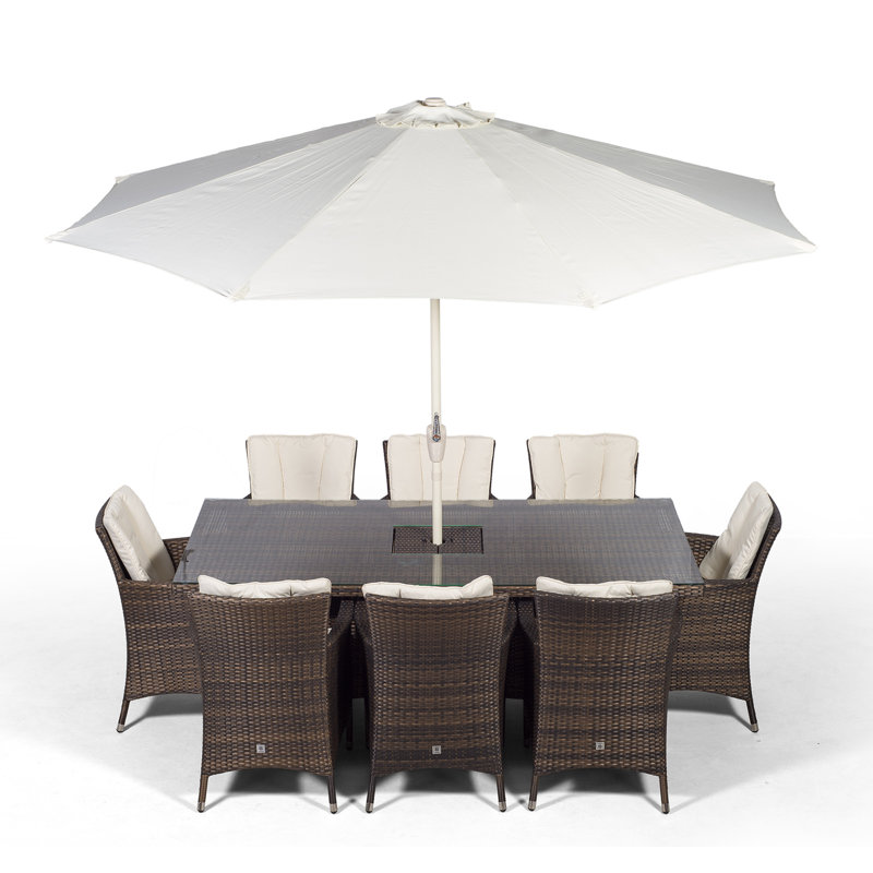 Karcher 8 - Person Wicker Patio Dining Set with Rectangular Table , Cushions Included, Brown