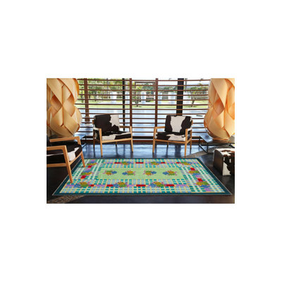 Tapis vert tissé à motif géométrique vert