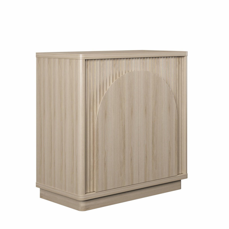 Armoire d'appoint moderne et minimaliste avec façade arquée et rangement personnalisable, parfaite pour les espaces de vie contemporains.
