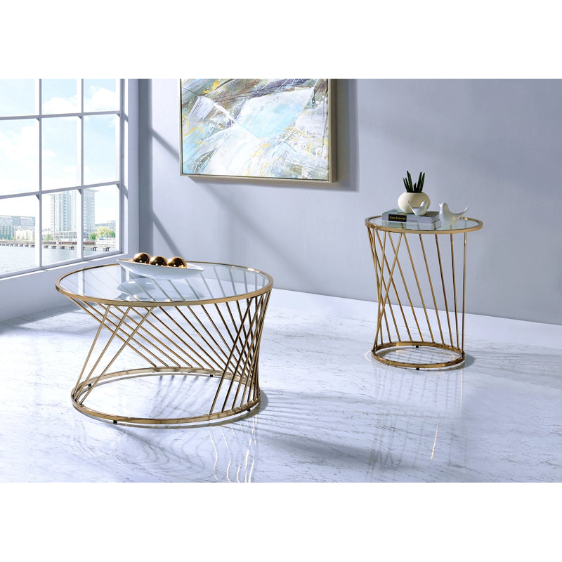 Table basse en verre transparent avec finition champagne Bluelipe