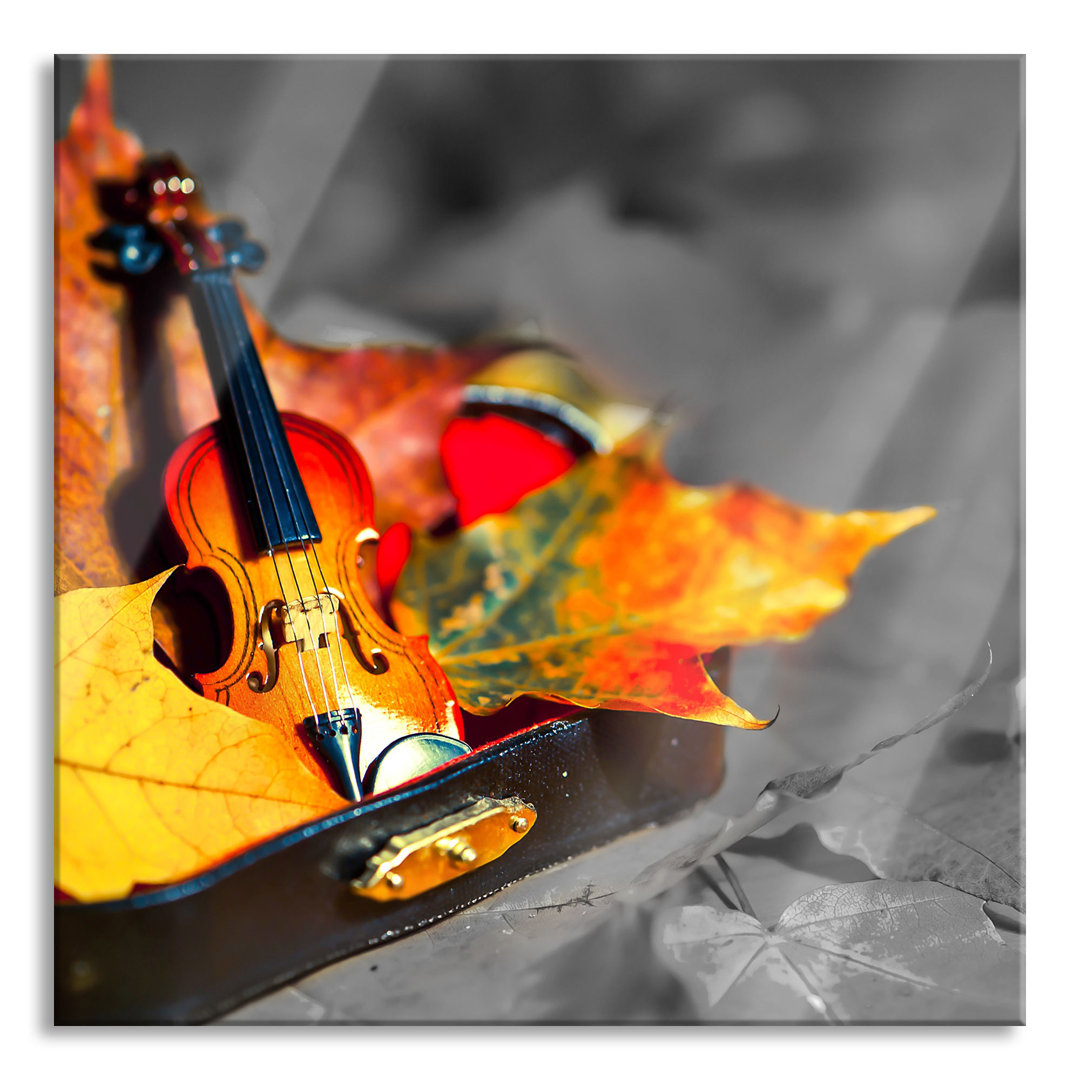 Ungerahmtes Foto auf Glas "Violine umgeben von Blättern"