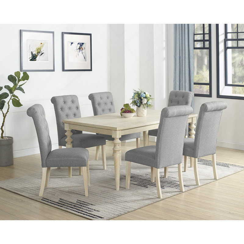 Ensemble de salle à manger exquis 7 pièces avec table de salle à manger à pieds tournés et 6 chaises capitonnées pour une expérience culinaire sophistiquée