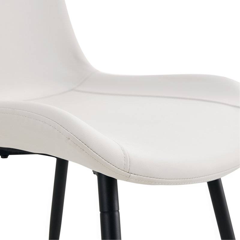 Ensemble de table et de chaises Ensemble de table de salle à manger moderne et minimaliste blanc de 42 pouces avec 4 chaises en polyuréthane artificiel blanc avec coussins incurvés. Convient à la salle à manger, au bureau, etc.