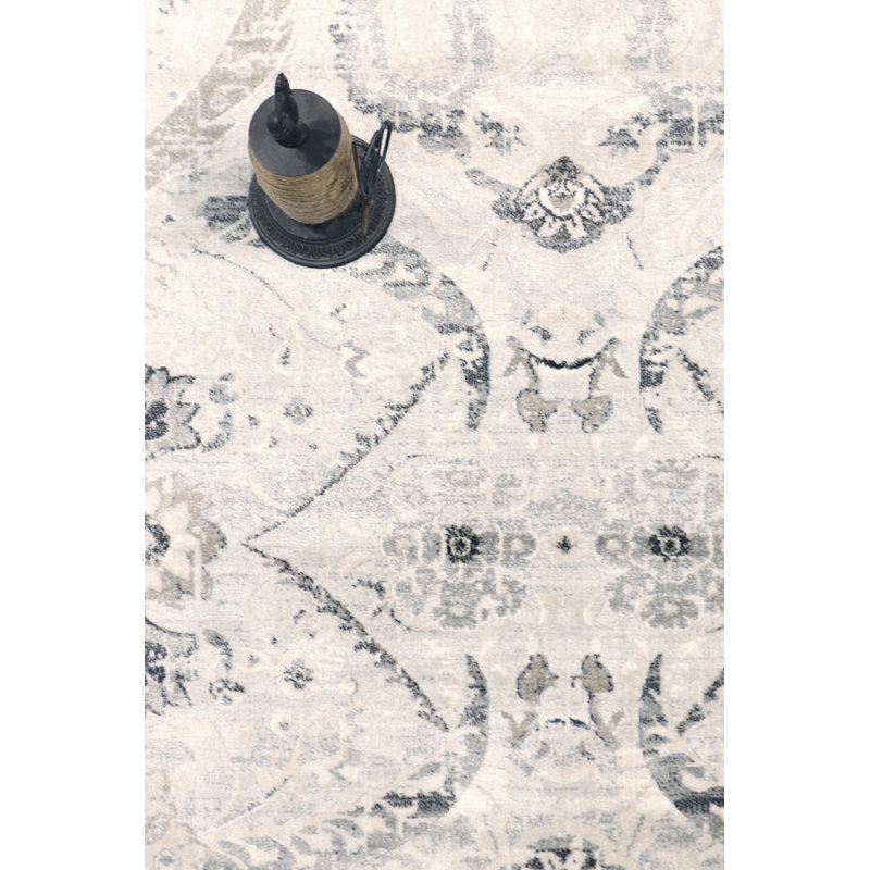 Ivory Elegance 4' x 6' Synthetic Rectangular Area Rug