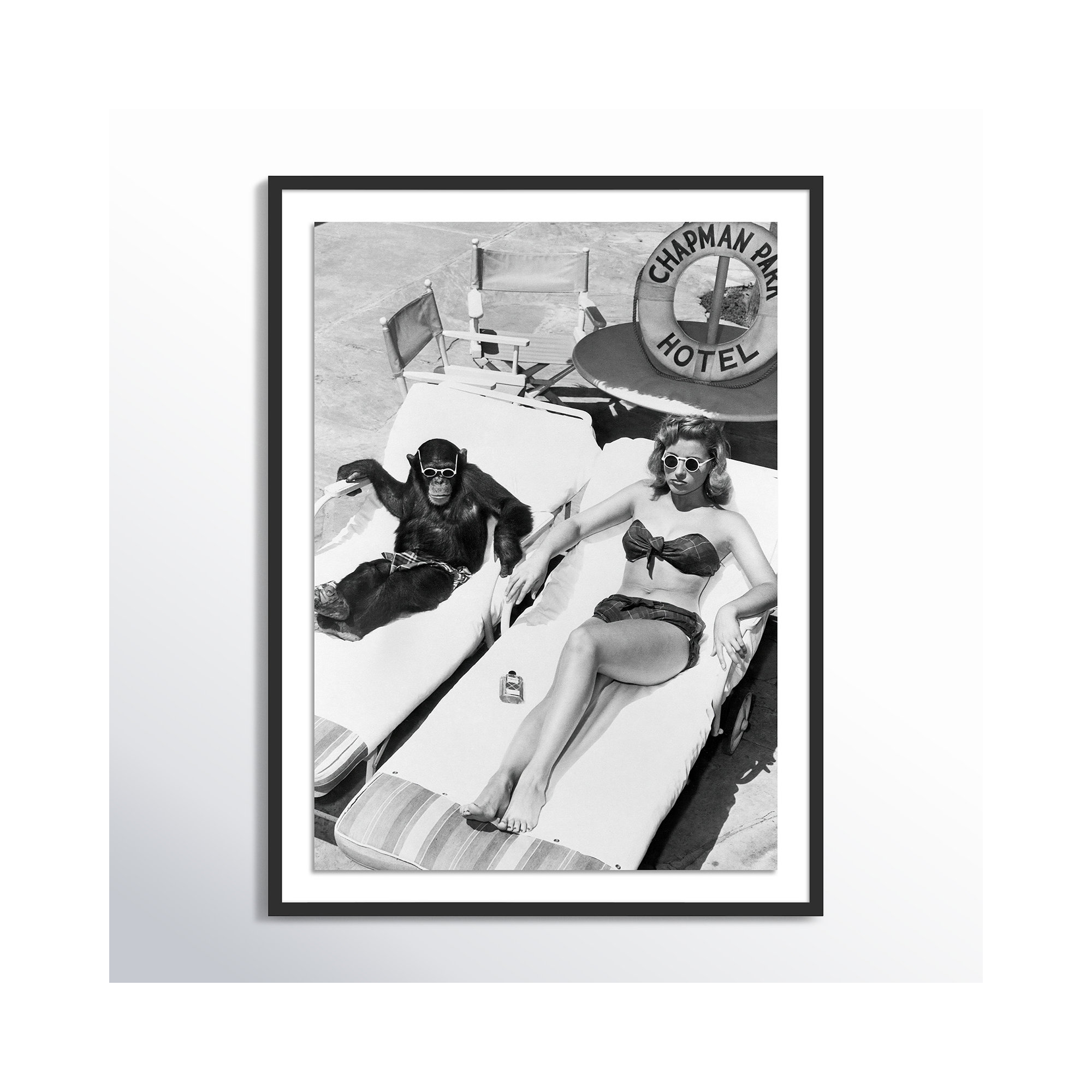 Woman Sunbathing With Chimpanzee by Getty Images, Black Maple Framed, 48" H x 36" W
