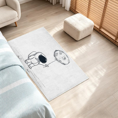 Tapis intérieur transparent lavable à la machine avec un joli motif abstrait d'astronaute
