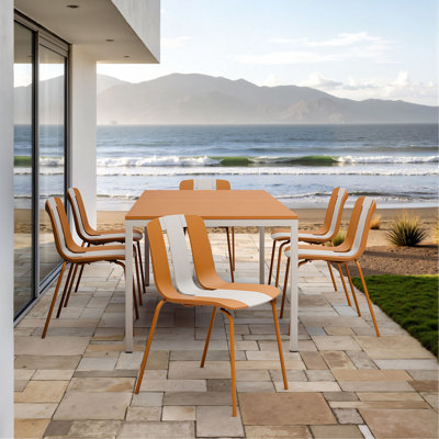 Holiday - Paquet de 4 chaises à blocs de couleur à rayures modernes - Siège en plastique PP intérieur / extérieur et pieds en métal robustes, éclatants, orange - pour le salon, le balcon, le café, la terrasse