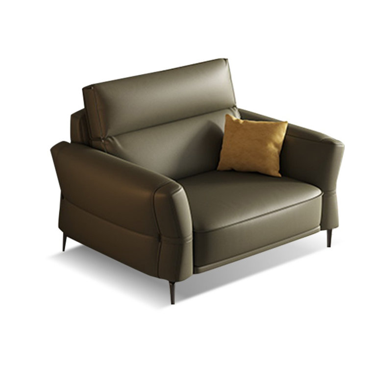 Fauteuil vert avec coussin en cuir véritable