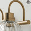 Luminaire pour meuble-lavabo en laiton antique à 3 lumières Kella, verre transparent Lotus, base E26, fixation murale pour salle de bain