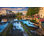 Paysage à l'aube de la ville entourée de canaux d'eau - photographie sur toile tendue