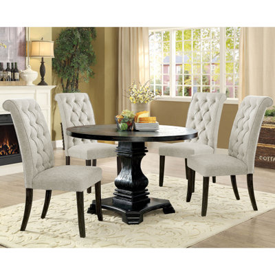 Biyron 4 - Person Pedestal Dining Set
