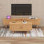 Ensemble de meuble télé et table basse en bois avec station de charge, console média cannelée ovale avec portes coulissantes