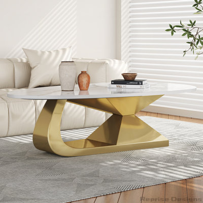 Table basse moderne en pierre frittée avec base en acier inoxydable, durable et élégante pour les espaces de vie contemporains