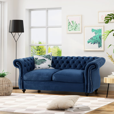 Bouton profond en velours bleu marine pour une décoration intérieure chic
