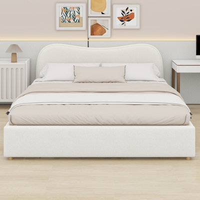 Minimalist Upholstered Platform Bed Featuring Wood Slats