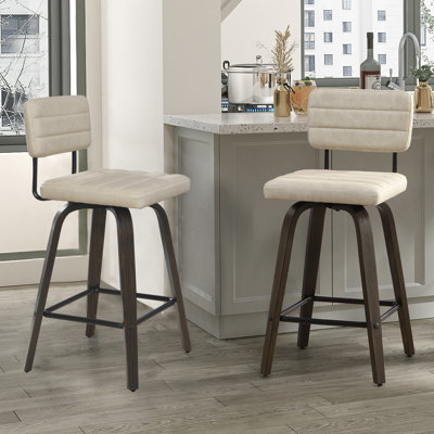 Swivel Upholstered 25.2" Faux Leather Counter Stool with Wood Frame by 17 Stories