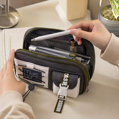 Trousse à crayons grande capacité à double fermeture éclair et poche à boucle, idéale pour les étudiants et les adolescents.