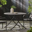 Foldable Round Wicker Dining Table for Outdoor Hosting
