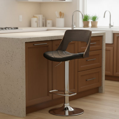 Chichica Swivel Adjustable Height Bar Stool by Wade Logan