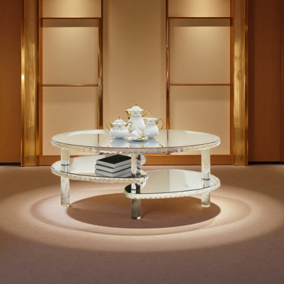Table basse ovale à double couche avec pieds en acrylique et miroir en cristal
