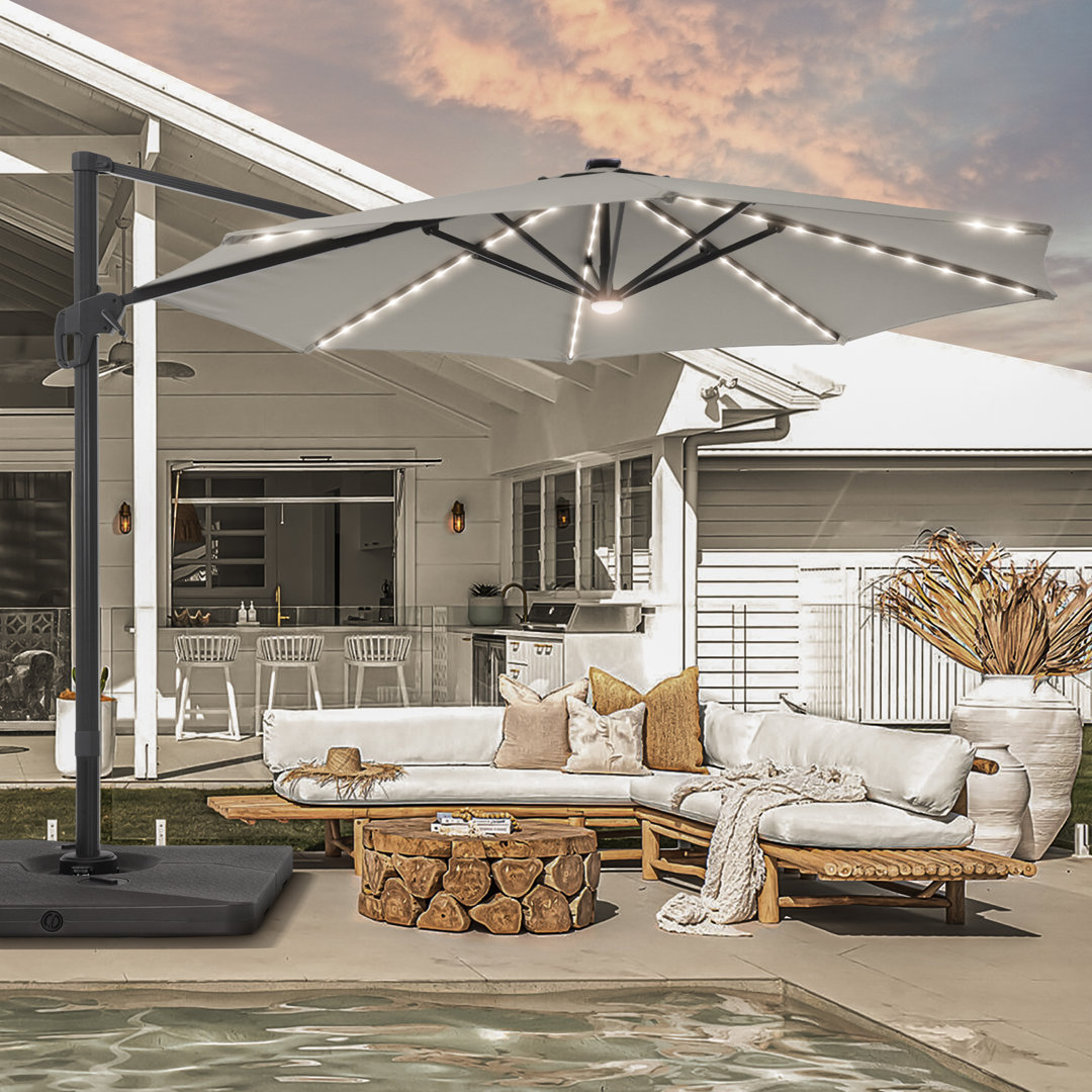 Eirlys 132'' Lighted Cantilever Umbrella with Crank Lift Counter Weights Included Latitude Run® Fabric