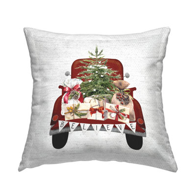Believe Christmas Gifts Truck Outdoor Printed Pillow by Lettered and Lined