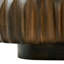 Table basse ronde en bois massif sculpté au design sculptural élégant