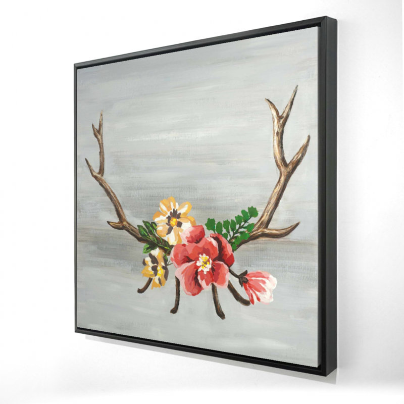 "Cornes de cerf avec des fleurs"