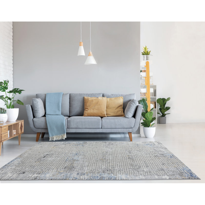 Tapis bleu surdimensionné 9 pi 10 po x 10 pi 6 po Austin Devine de United Weavers
