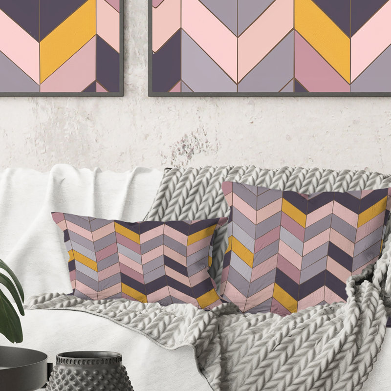 Coussin lombaire à chevrons mauve et rose