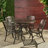 Calisa 4 - Person Patio Dining Set with Round Table