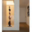 Statue minimaliste en bois pour plancher, design organique vertical incurvé