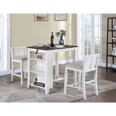 White Finish Counter Height Dining Table With 2 Chairs & Shelves, Collection. Charging. Space Saving. Table: 36"w X 28"d 35.5"h. Chair: 20"w 21"d 33"h. 17.5" Seat Depth. Cream Fabric 36" Finish.