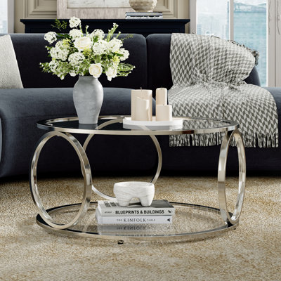 Table basse ronde en verre avec rangement ouvert