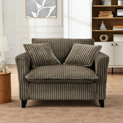 Fauteuil paresseux en velours côtelé avec une bonne résilience, confortable pour les longues séances de lecture en brun