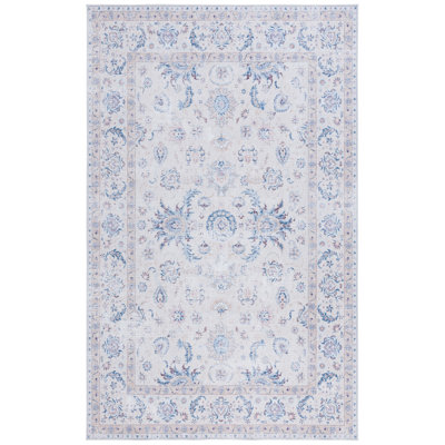 Cvjatko Oriental Machine Woven Polyester Area Rug in Ivory/Blue