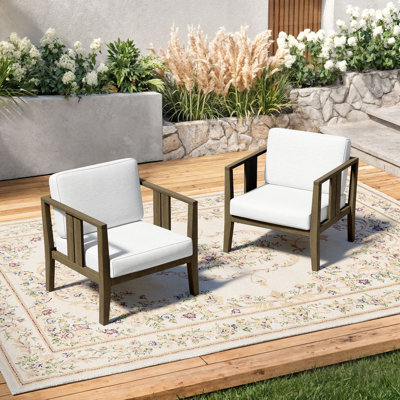 Chaise longue d'extérieur en bois de teck avec coussin et accoudoirs Junco