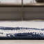 Tapis ivoire / bleu marine Amee-540416431