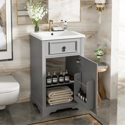 Meuble-lavabo de 20 pouces avec lavabo en céramique, porte à fermeture douce, tablette réglable et support de rangement fixé à la porte - idéal pour les petites salles de bain