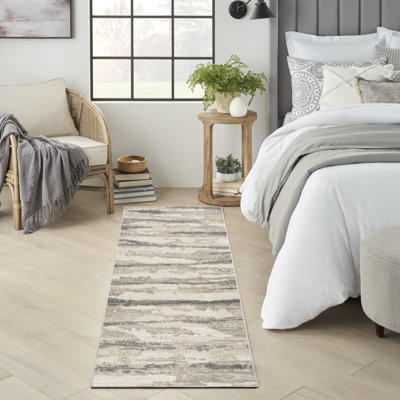 Tapis tissé durable à rayures Ivaline